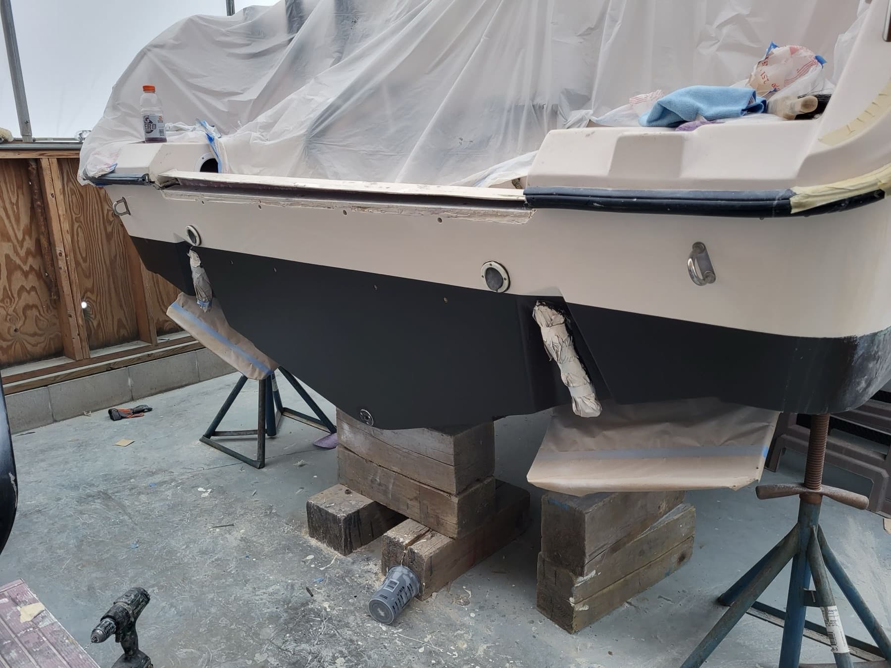 The rebuilt transom faired and painted, ready to go back into service.